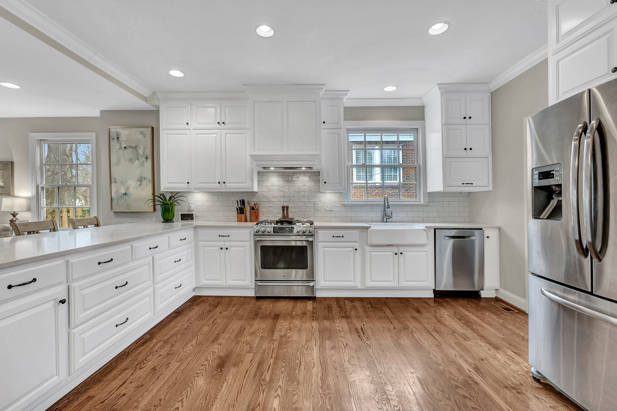4028 Aberdeen Road Nashville, TN 37205 - Photo 16 of 41 a kitchen with granite countertop white cabinets and stainless steel appliances