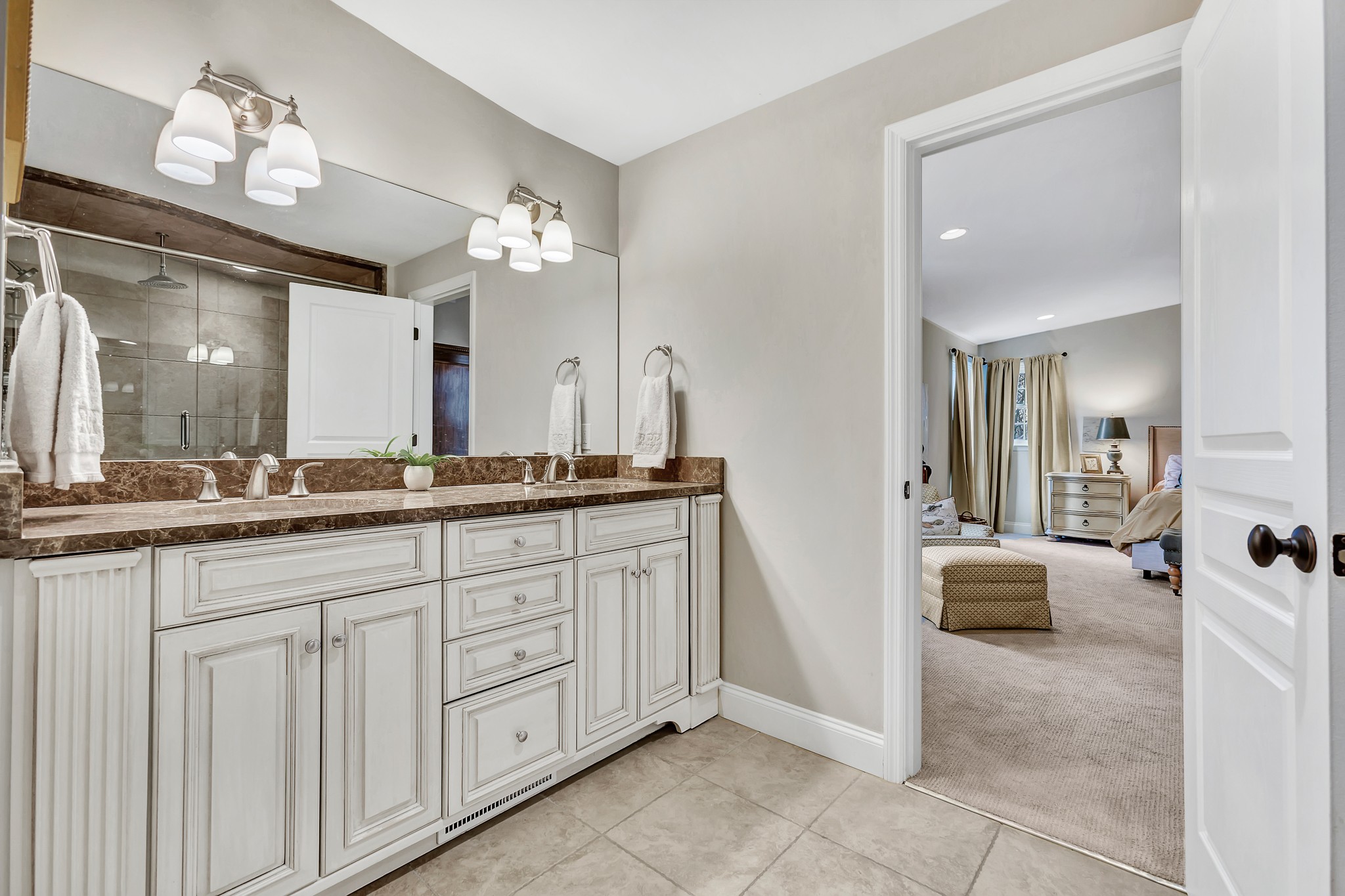 4028 Aberdeen Road Nashville, TN 37205 - Photo 27 of 41 a spacious en suite bathroom with a double vanity sink and a mirror