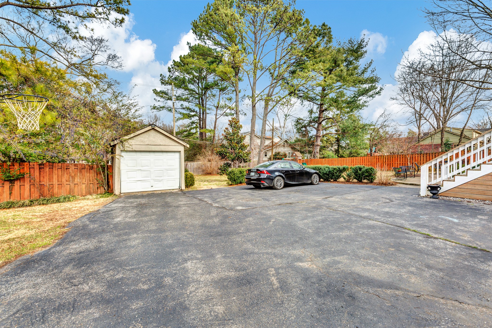 4028 Aberdeen Road Nashville, TN 37205 - Photo 37 of 41 a car parked in front of a house with a yard