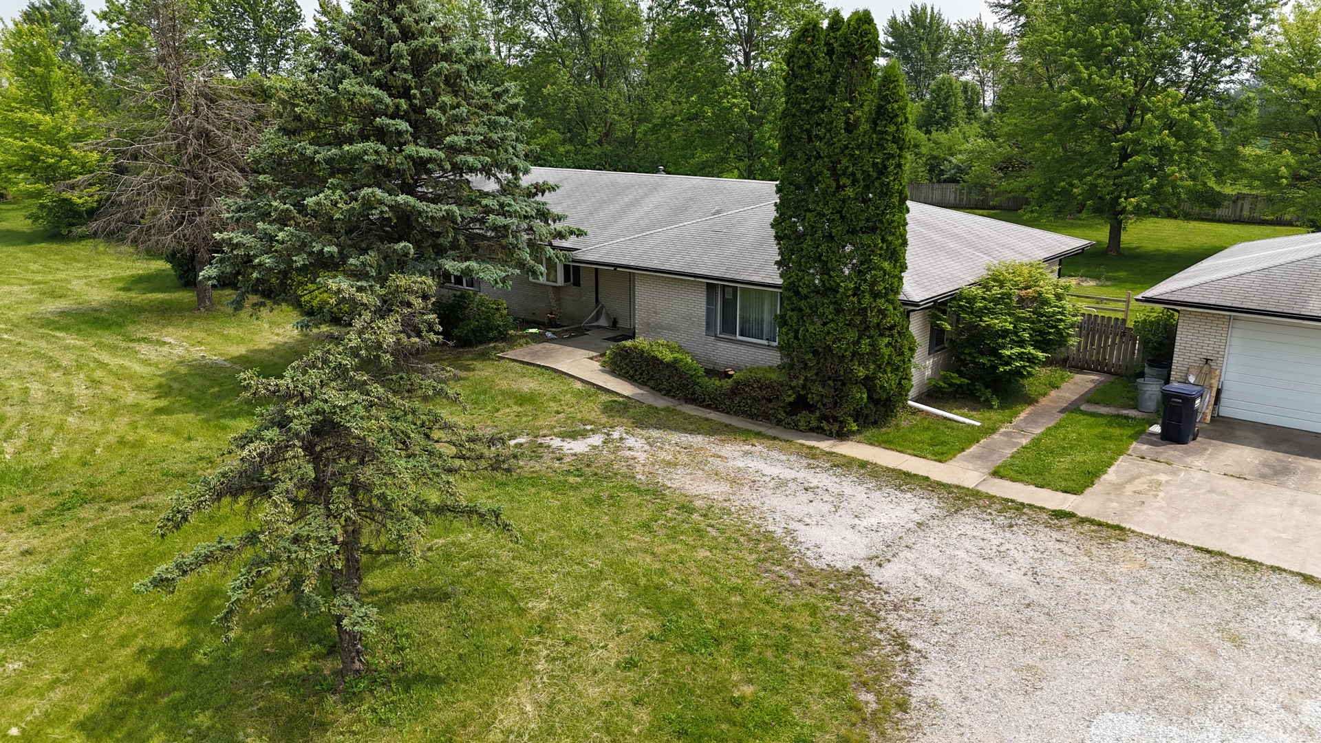 4247 West Church Road Peotone, IL 60468 - Photo 8 of 11 a view of a house with a yard and large tree