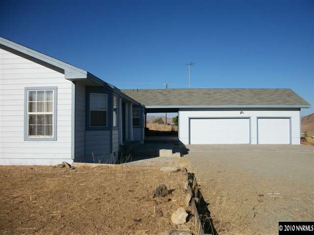 35 Rogers Ranch Road Sparks, NV 89441 - Photo 13 of 13 a view of a backyard of a house