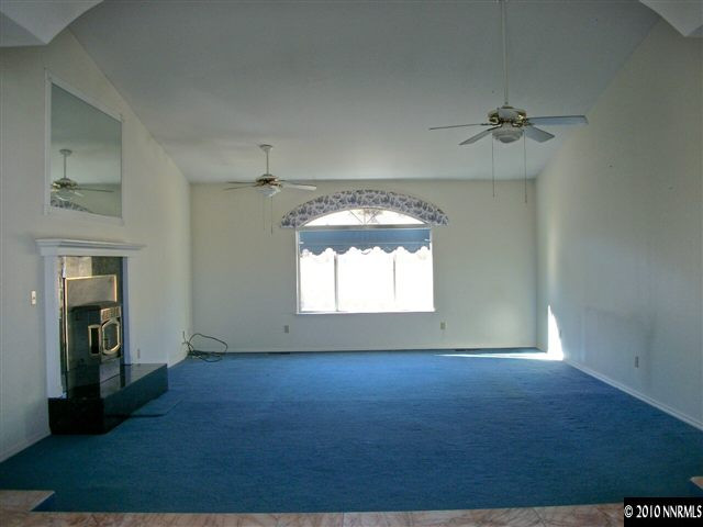 35 Rogers Ranch Road Sparks, NV 89441 - Photo 2 of 13 wooden floor in an empty room