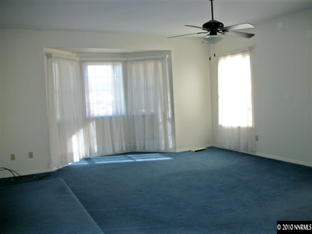 35 Rogers Ranch Road Sparks, NV 89441 - Photo 6 of 13 an empty room with windows