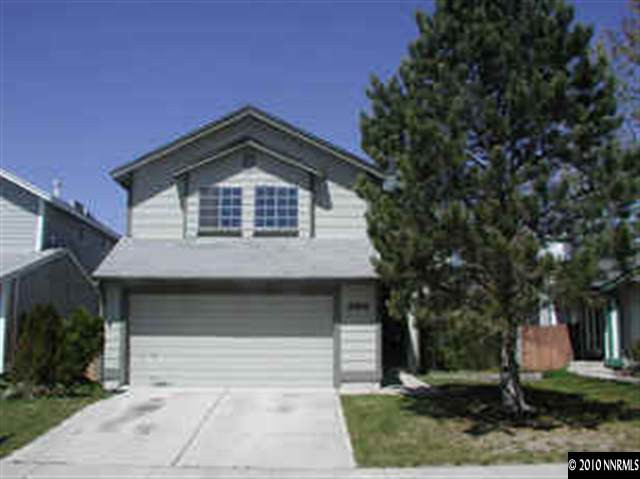 4309 Pescado Way Reno, NV 89502 - Photo 1 of 9 a front view of a house with a yard