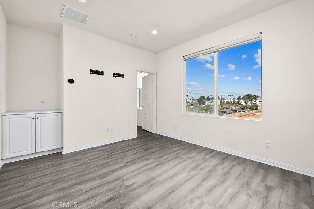 159 Steely Irvine, CA 92614 - Photo 15 of 30 Secondary bedroom with large window and ample natural light.