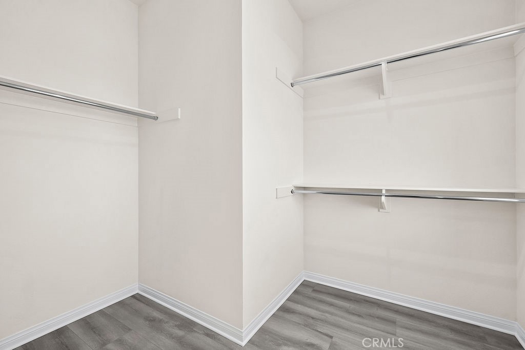 159 Steely Irvine, CA 92614 - Photo 16 of 30 Walk-in closet with built-in shelving for organized storage.