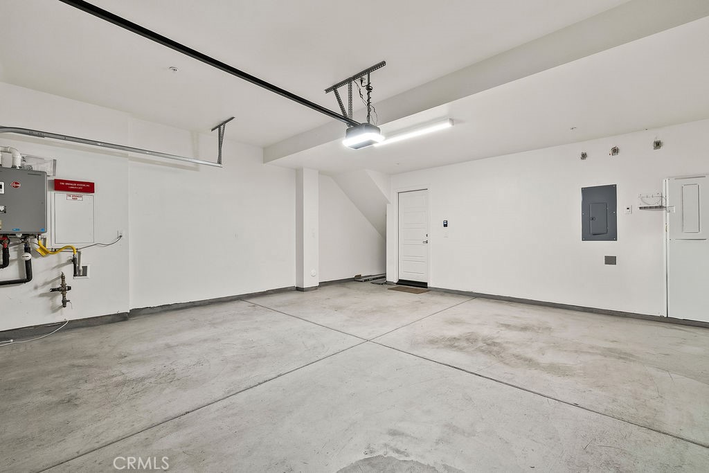 159 Steely Irvine, CA 92614 - Photo 18 of 30 Attached 2-car garage with direct access and overhead storage space.