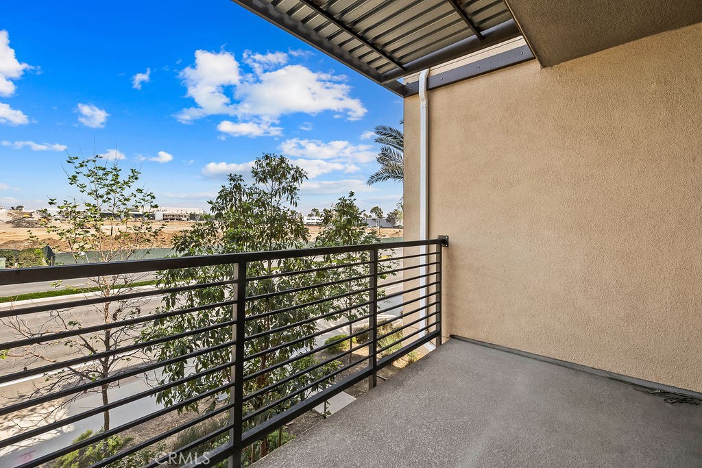 159 Steely Irvine, CA 92614 - Photo 21 of 30 Private balcony with open-air design and surrounding community views.