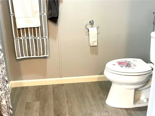 a bathroom with a toilet and a sink