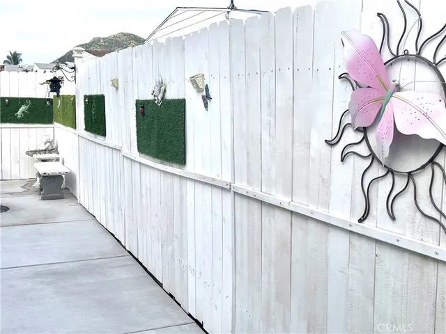 a view of a balcony with wooden floor