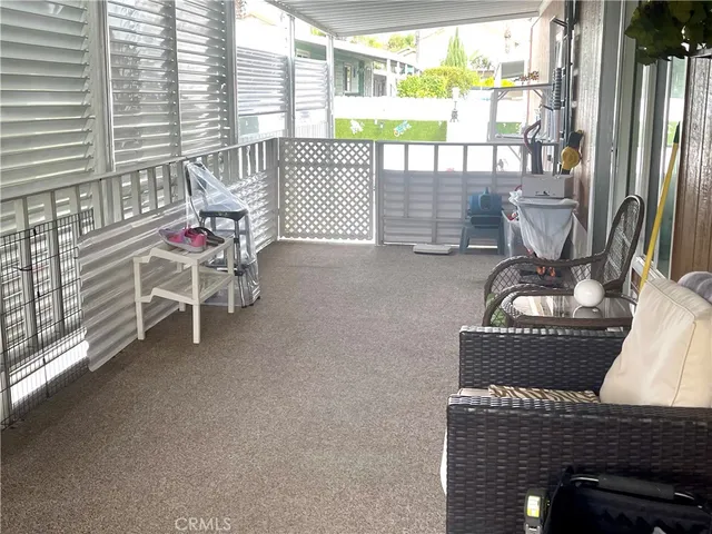 a work room with furniture and windows