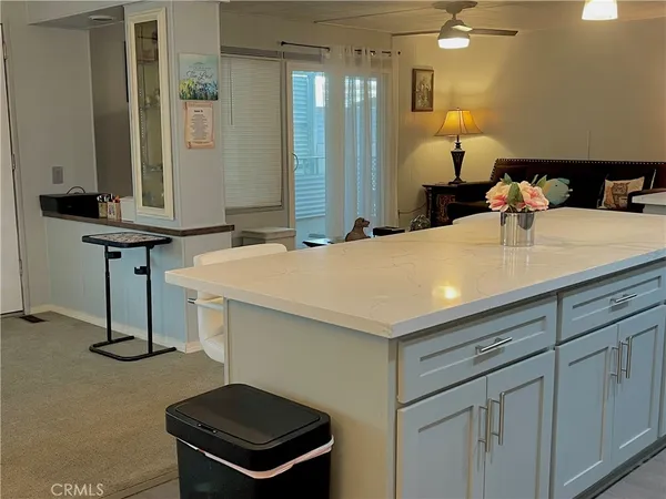 a room with a sink and a mirror