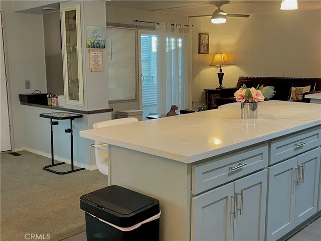 a room with a sink and a mirror