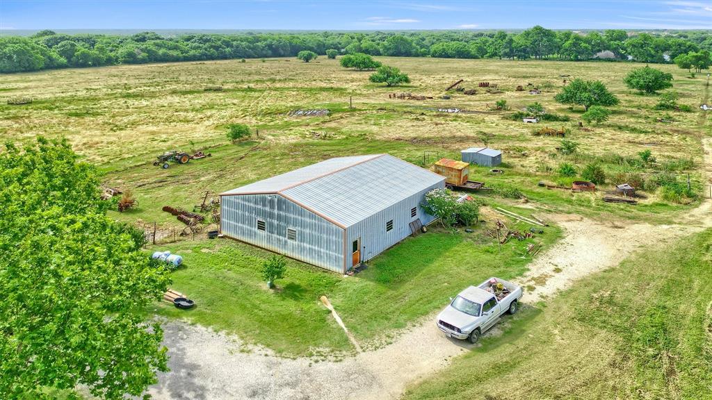 1730 Mackey Road Gunter, TX 75058 - Photo 14 of 21 a view of a lake with a house in the background