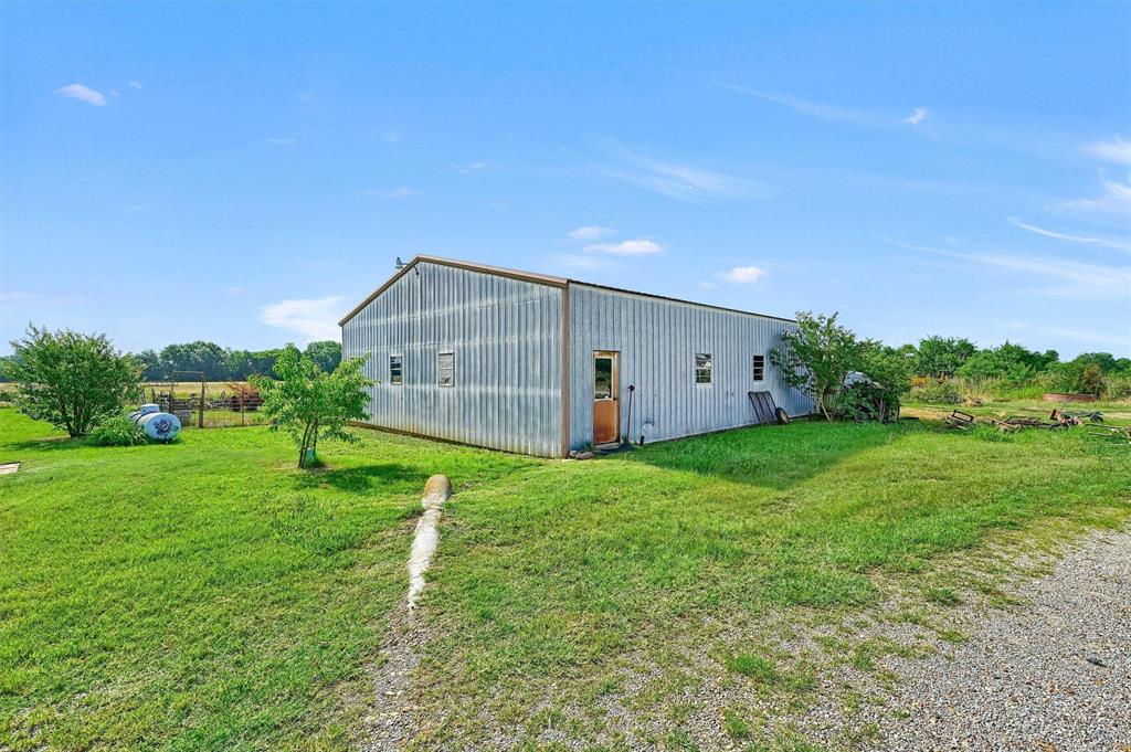 1730 Mackey Road Gunter, TX 75058 - Photo 19 of 21 a view of a back yard