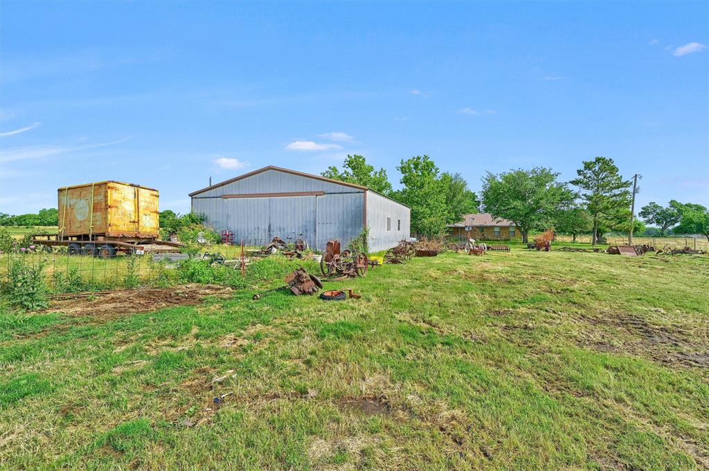 1730 Mackey Road Gunter, TX 75058 - Photo 20 of 21 a garden view with a seating space
