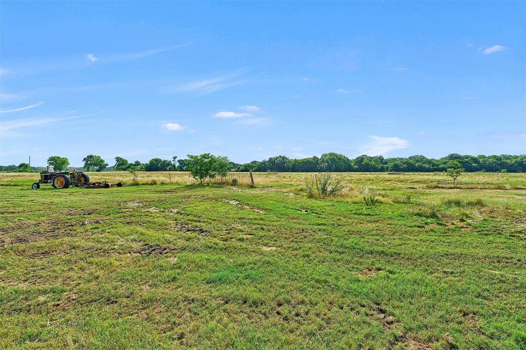 1730 Mackey Road Gunter, TX 75058 - Photo 21 of 21 a view of a lake with houses in the back