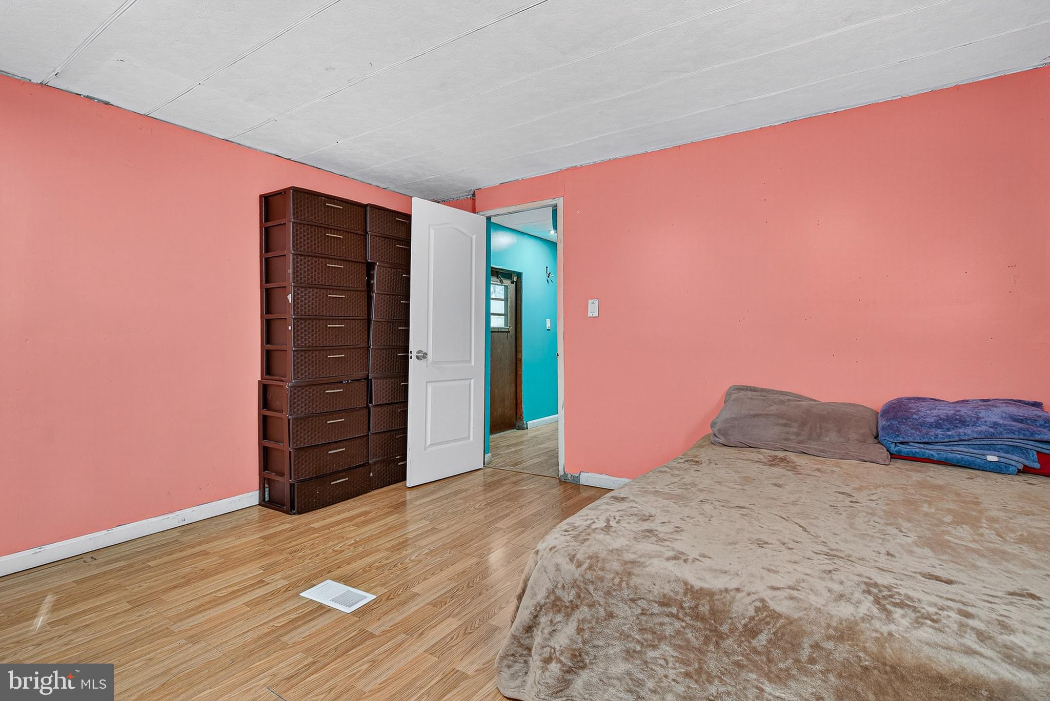 210 Trailway Road Middle River, MD 21220 - Photo 15 of 17 a view of wooden floor and windows in a room