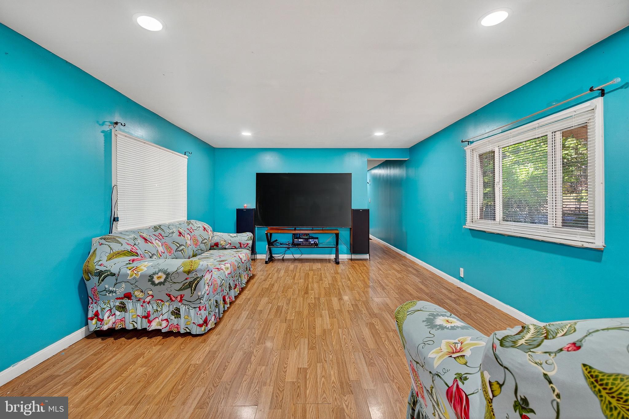 210 Trailway Road Middle River, MD 21220 - Photo 6 of 17 a bedroom with a bed and a flat screen tv