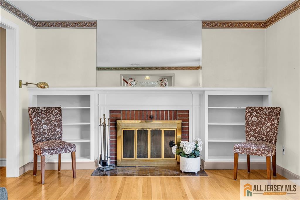 20 Oak Hills Road Edison, NJ 08820 - Photo 13 of 41 a view of living room with furniture and a fireplace
