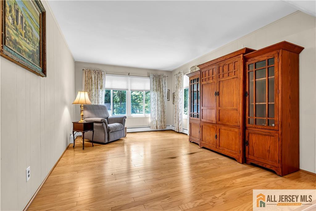 20 Oak Hills Road Edison, NJ 08820 - Photo 15 of 41 a view of a livingroom with furniture and wooden floor