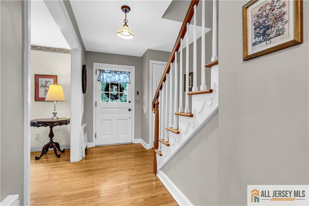20 Oak Hills Road Edison, NJ 08820 - Photo 21 of 41 a view of an entryway with wooden floor