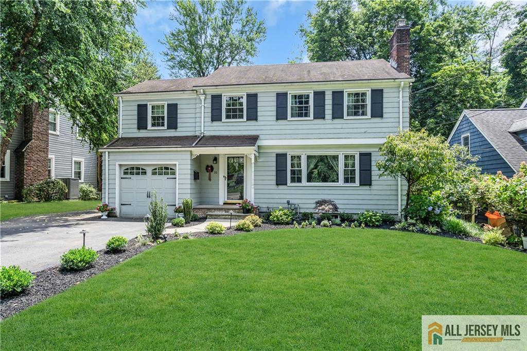 20 Oak Hills Road Edison, NJ 08820 - Photo 41 of 41 a front view of a house with a yard and porch