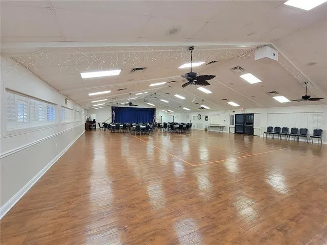 a view of a room with lots of wooden floor
