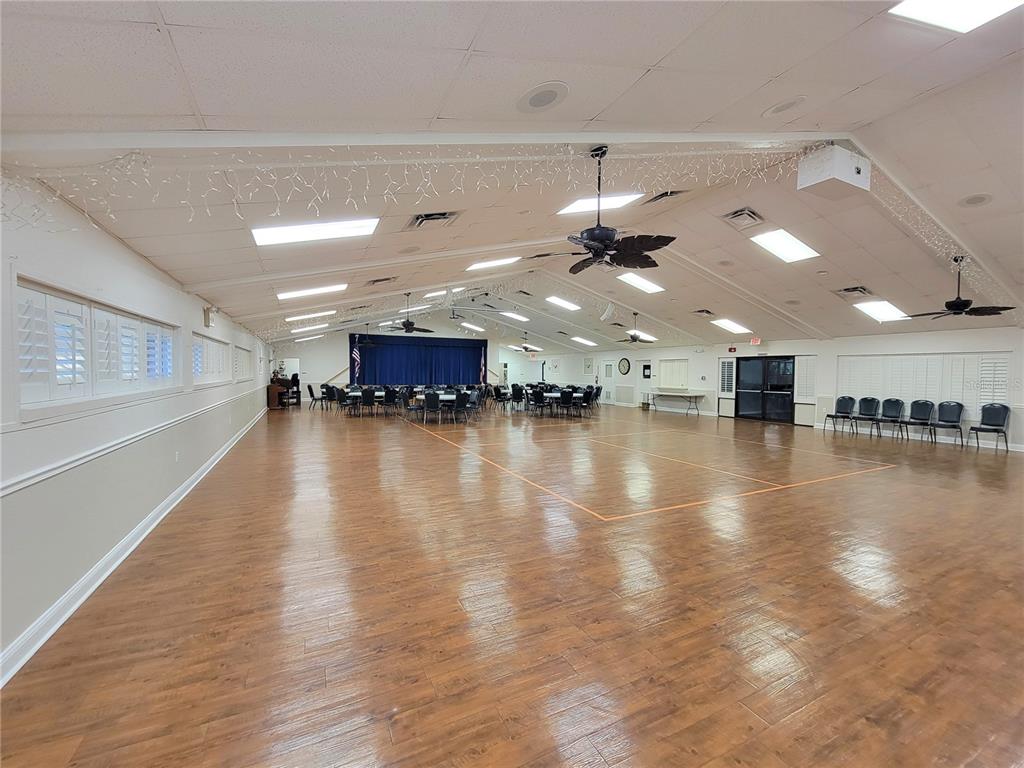 11203 Pembridge Court, Unit 1 Port Richey, FL 34668 - Photo 29 of 32 a view of a room with lots of wooden floor