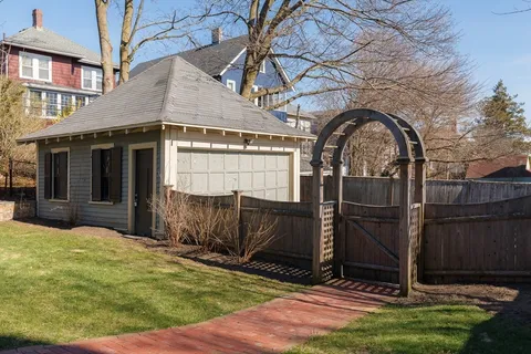 a view of a backyard of the house