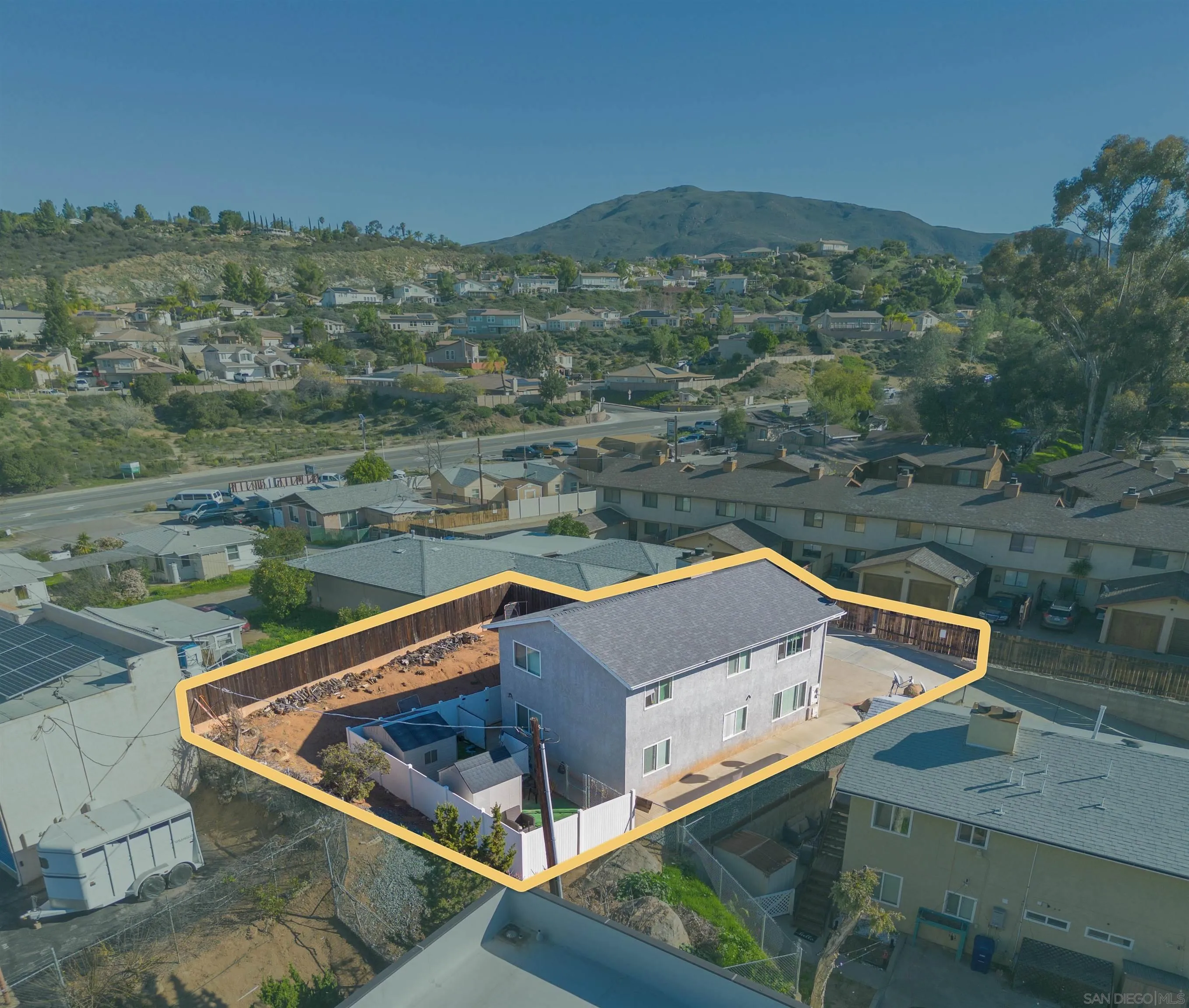 a view of a pool with a yard