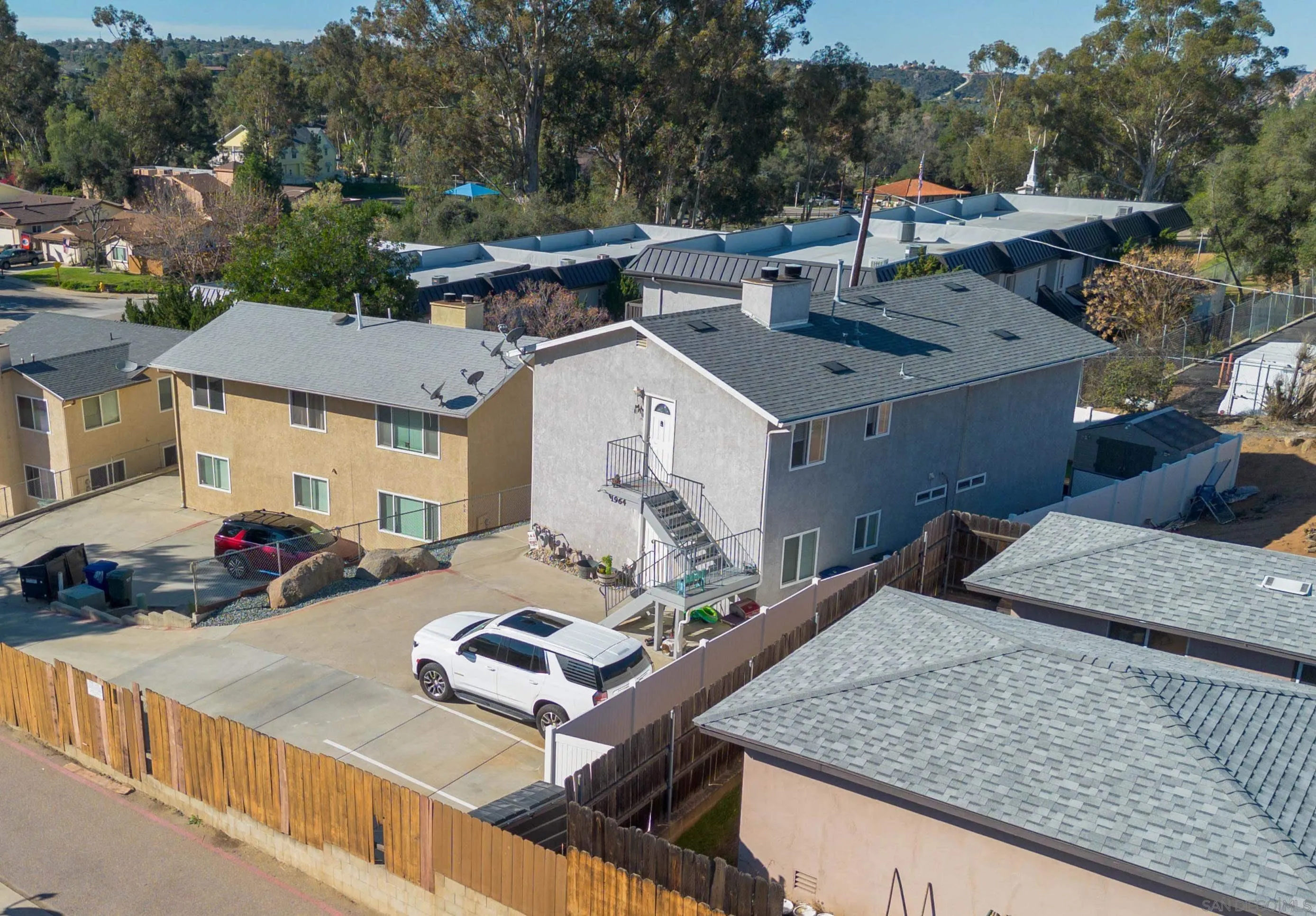 1964 Arnold Way Alpine, CA 91901 - Photo 5 of 9 a view of a house with roof deck and couches
