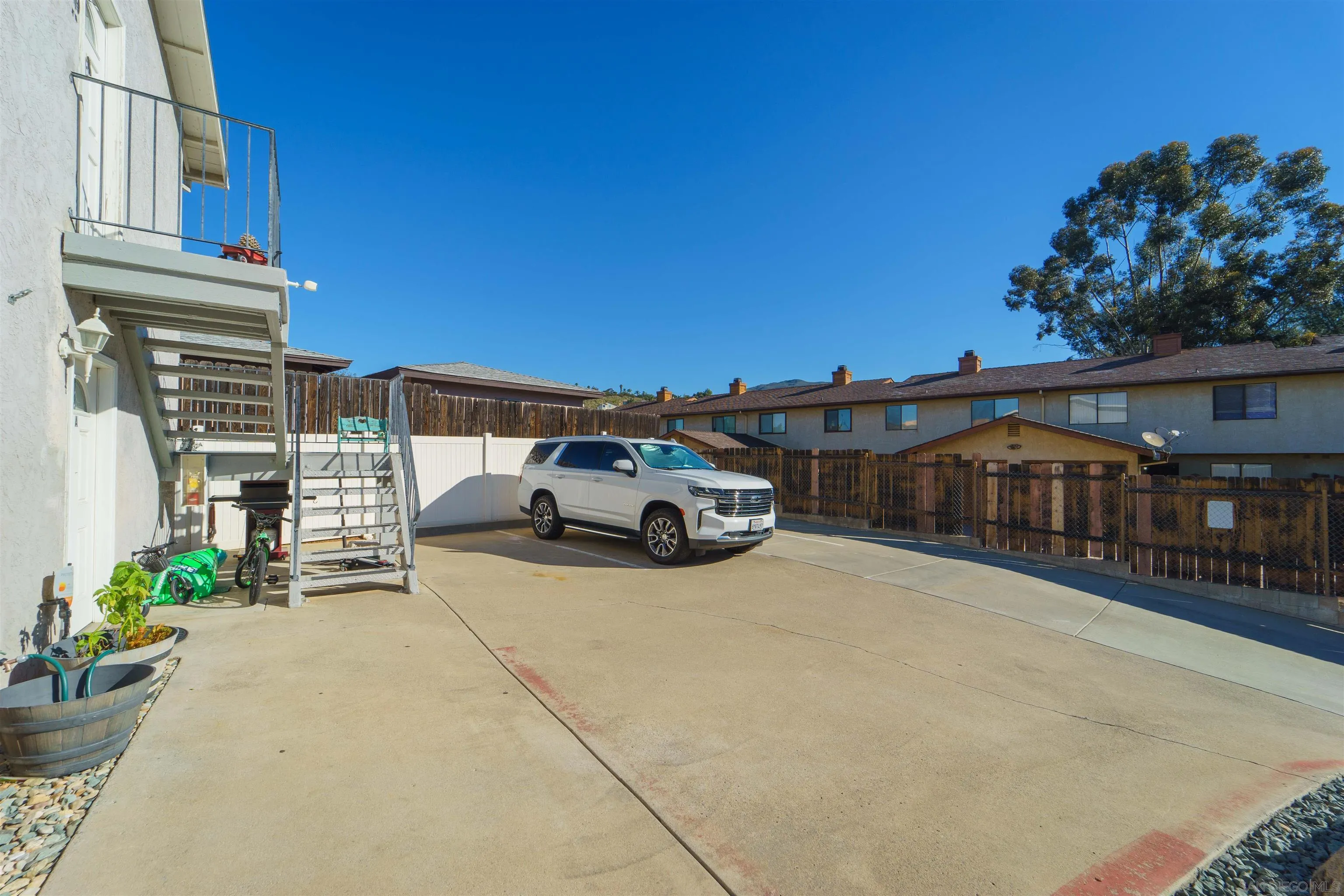 1964 Arnold Way Alpine, CA 91901 - Photo 8 of 9 a view of a car park in front of house
