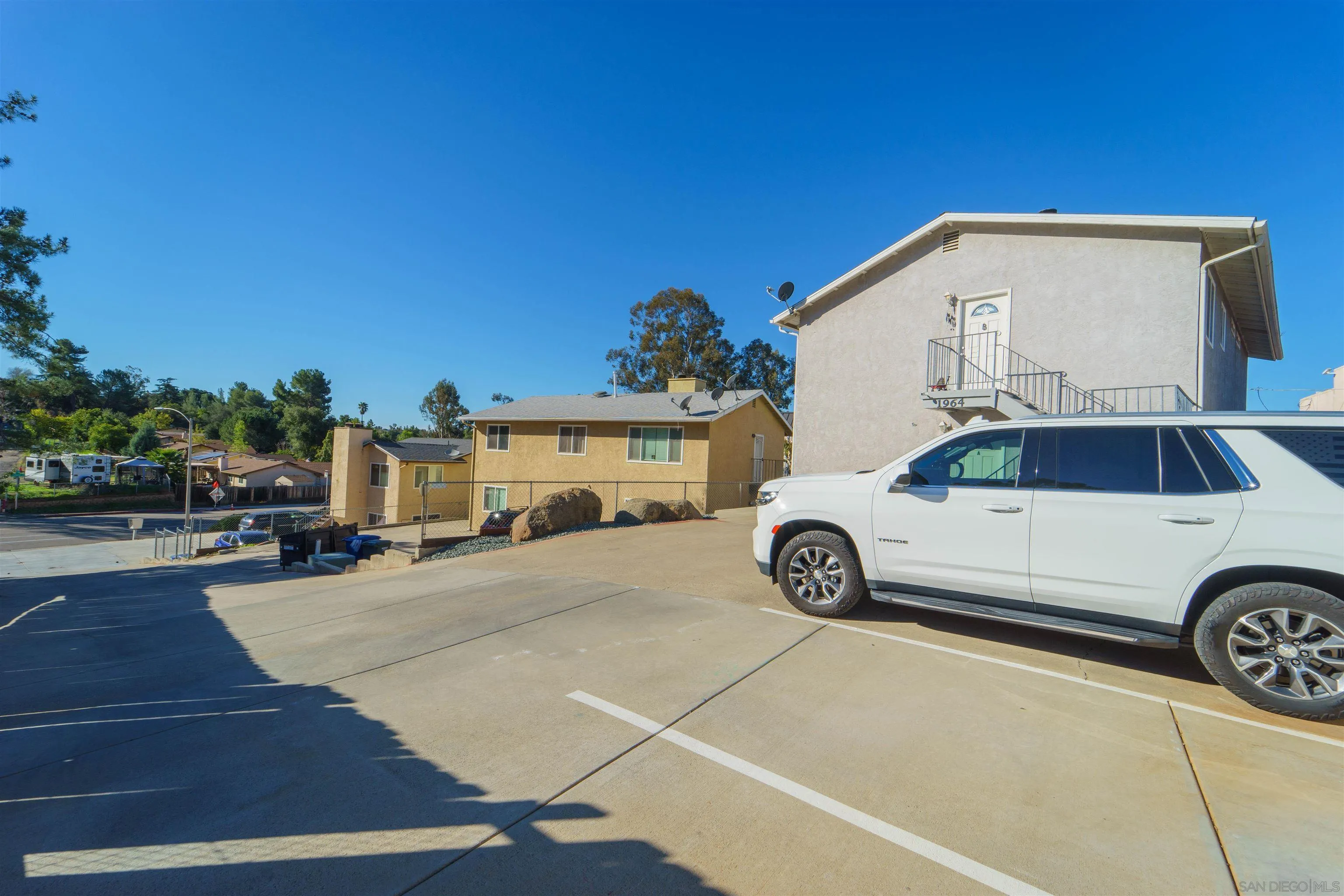 1964 Arnold Way Alpine, CA 91901 - Photo 9 of 9 a view of a car parked in front of a house