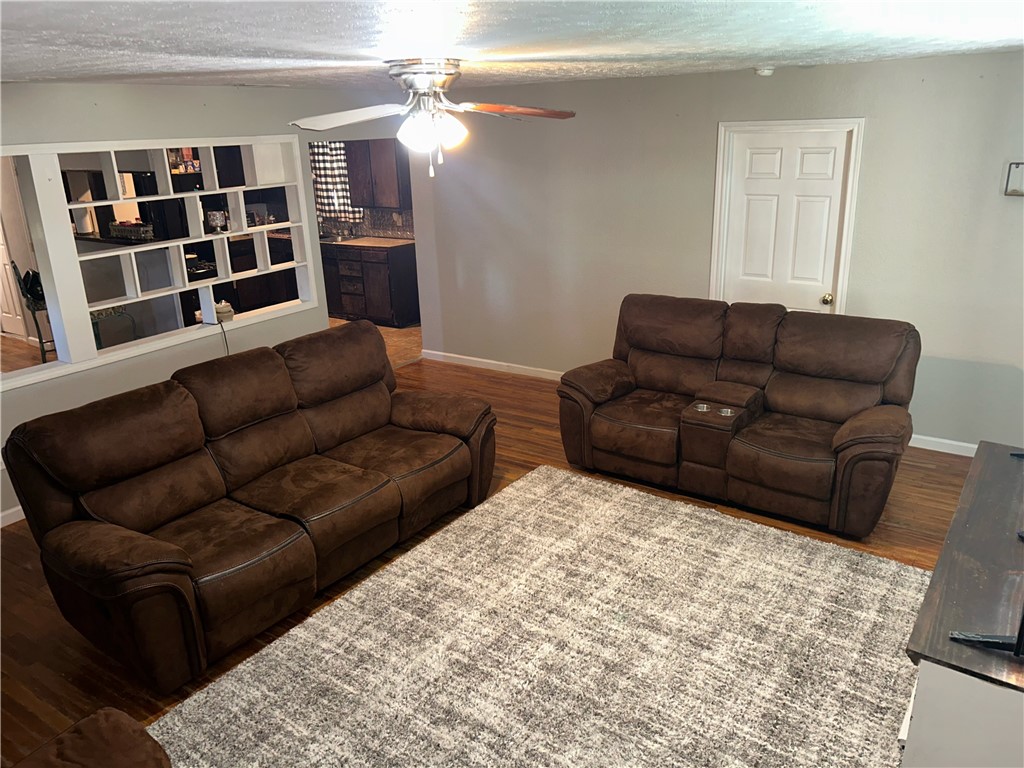 202 Coryell City Road Gatesville, TX 76528 - Photo 11 of 15 a living room with furniture and a rug