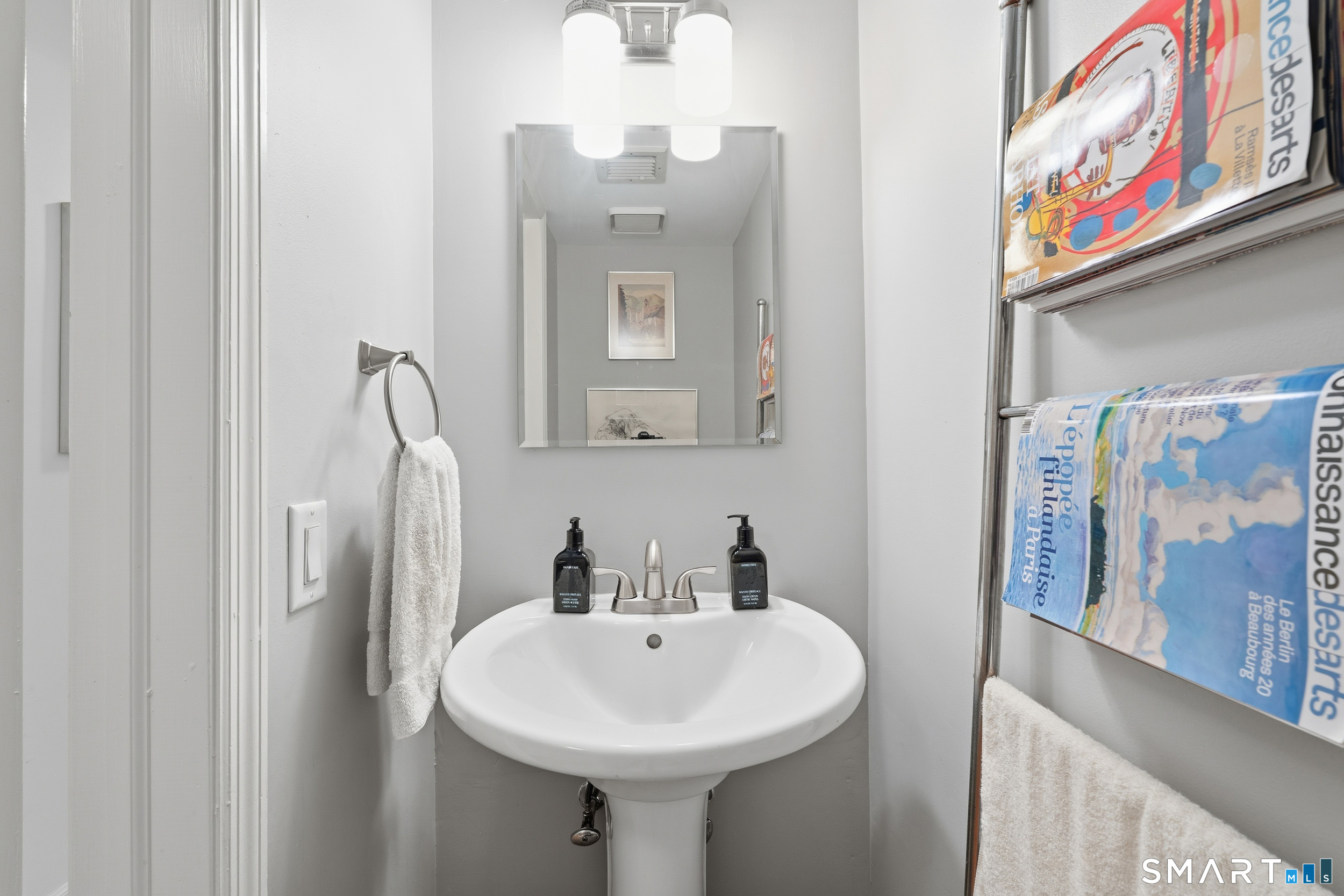 91 Highland Road, Unit 91 Stamford, CT 06901 - Photo 5 of 15 a bathroom with a sink and mirror
