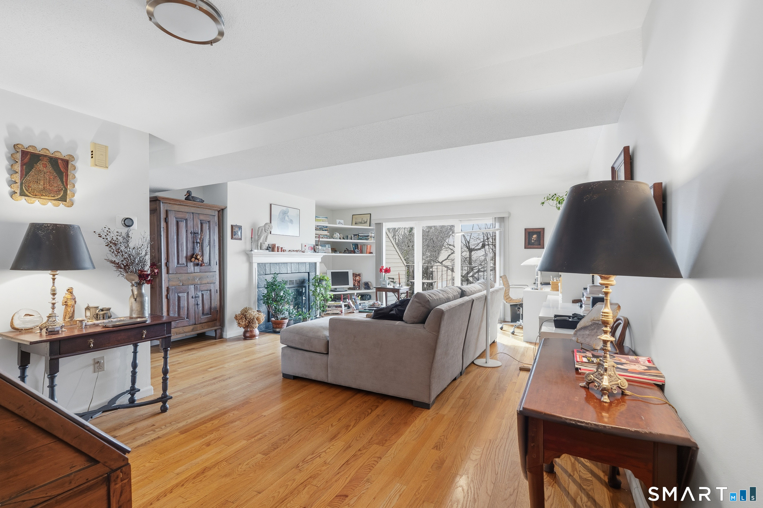 91 Highland Road, Unit 91 Stamford, CT 06901 - Photo 7 of 15 a living room with furniture