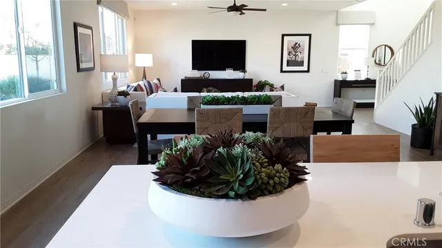 a living room with furniture lamp and a lamp