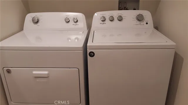 a bathroom with a bathtub and window