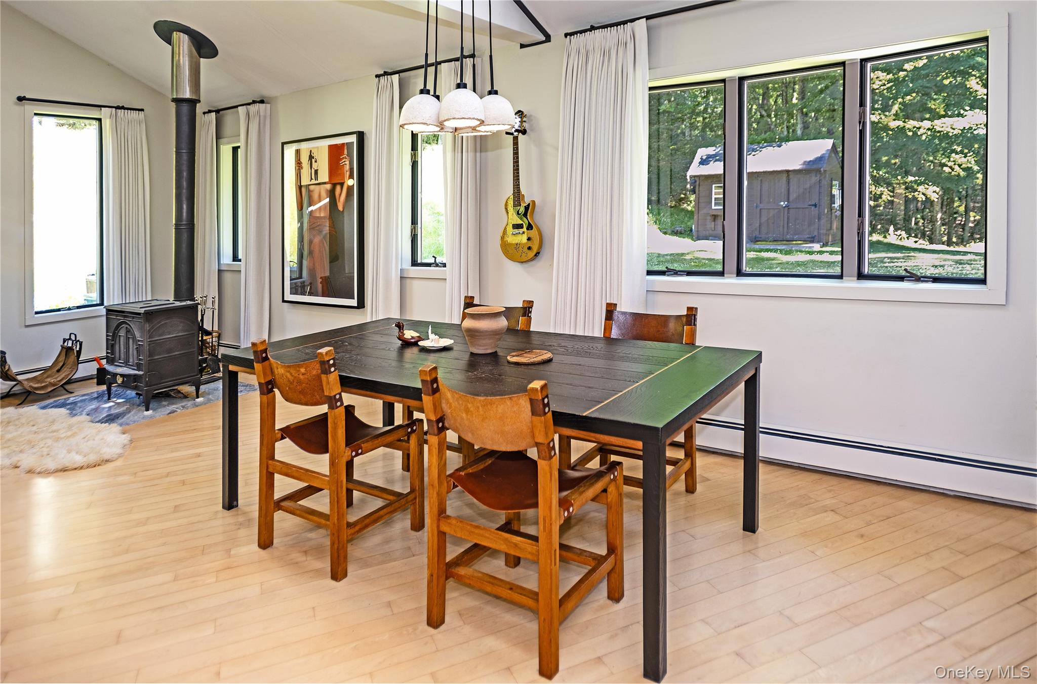340 Upper Pine Kill Road Wurtsboro, NY 12790 - Photo 5 of 13 Dining room table with large view of the backyard.
