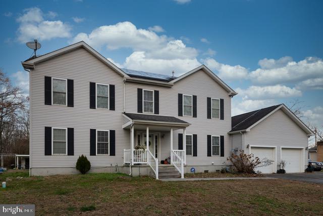 212 Strittmatter Boulevard Gibbstown, NJ 08027 - Photo 1 of 31 a front view of a house with garden