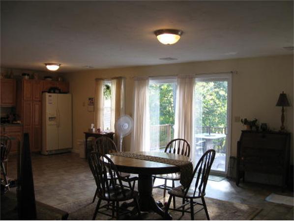 13 Black Point Road Webster, MA 01570 - Photo 8 of 22 a view of a dining room with furniture and window