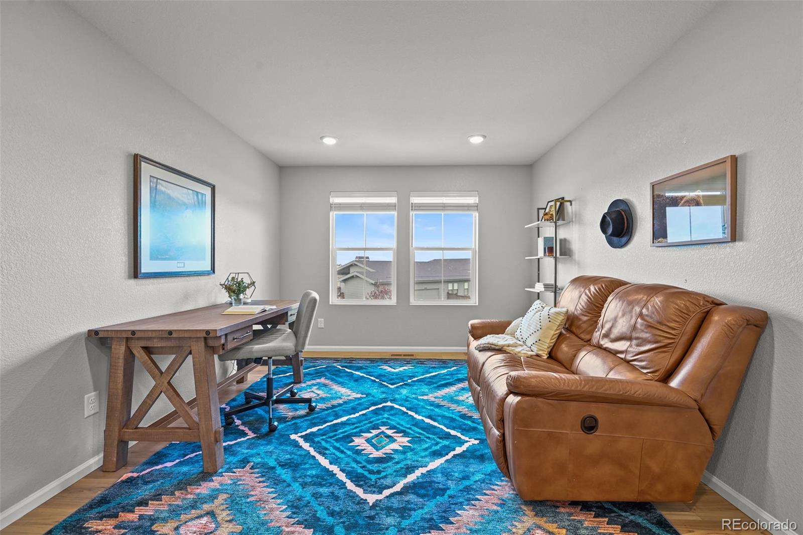 6374 North Fulton Street Denver, CO 80238 - Photo 18 of 49 a living room with furniture and a window