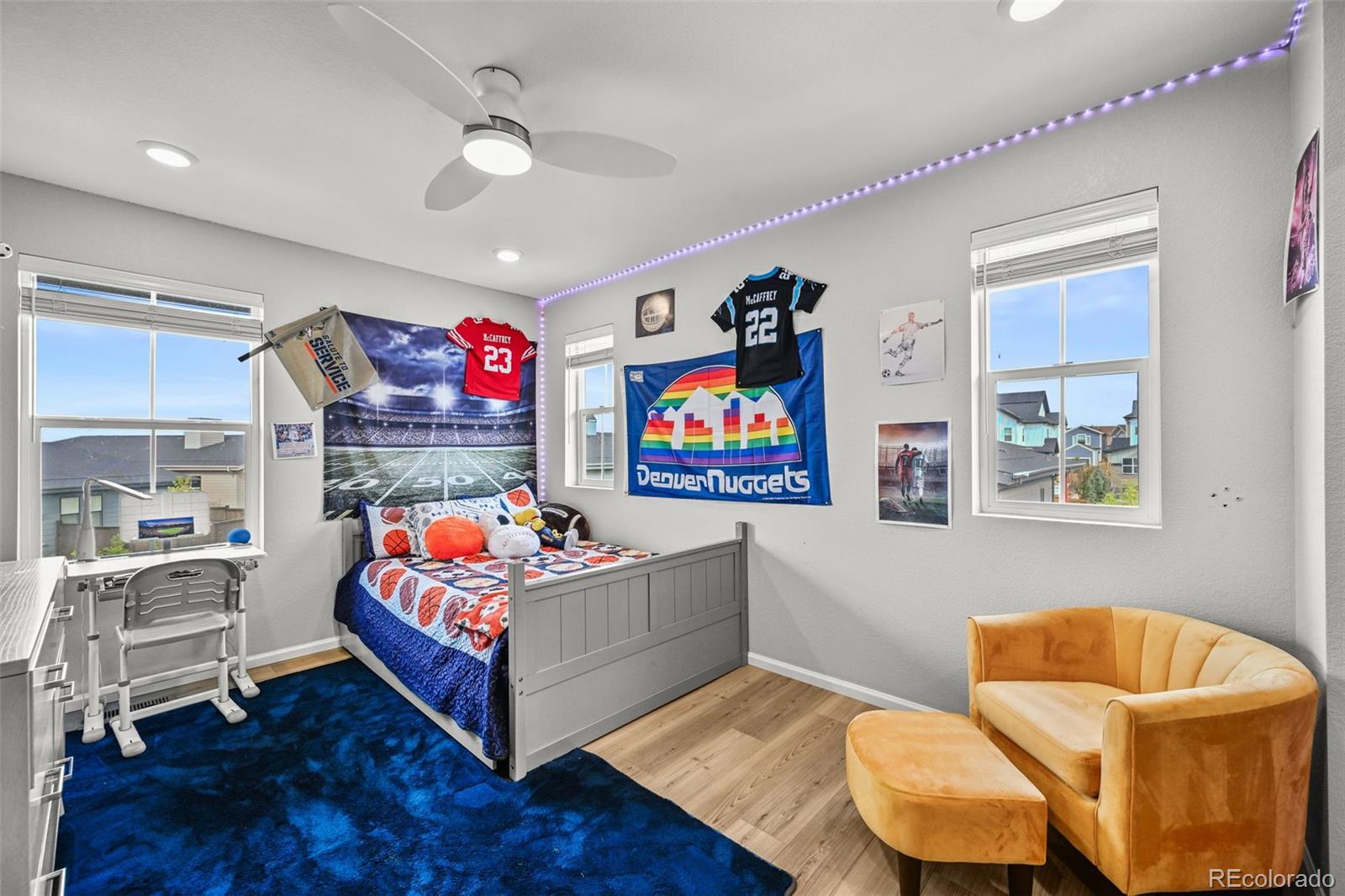 6374 North Fulton Street Denver, CO 80238 - Photo 31 of 49 a living room with furniture and a couch