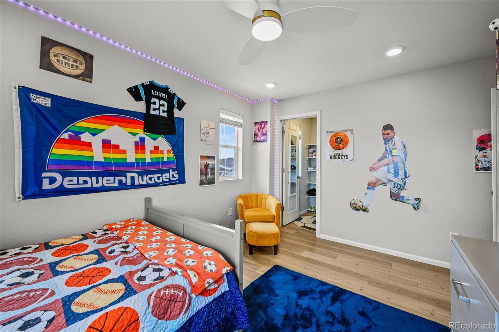 6374 North Fulton Street Denver, CO 80238 - Photo 32 of 49 a bedroom with bed and furniture