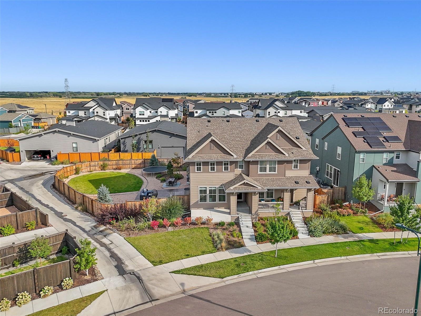 6374 North Fulton Street Denver, CO 80238 - Photo 42 of 49 an aerial view of a house with a garden and deck