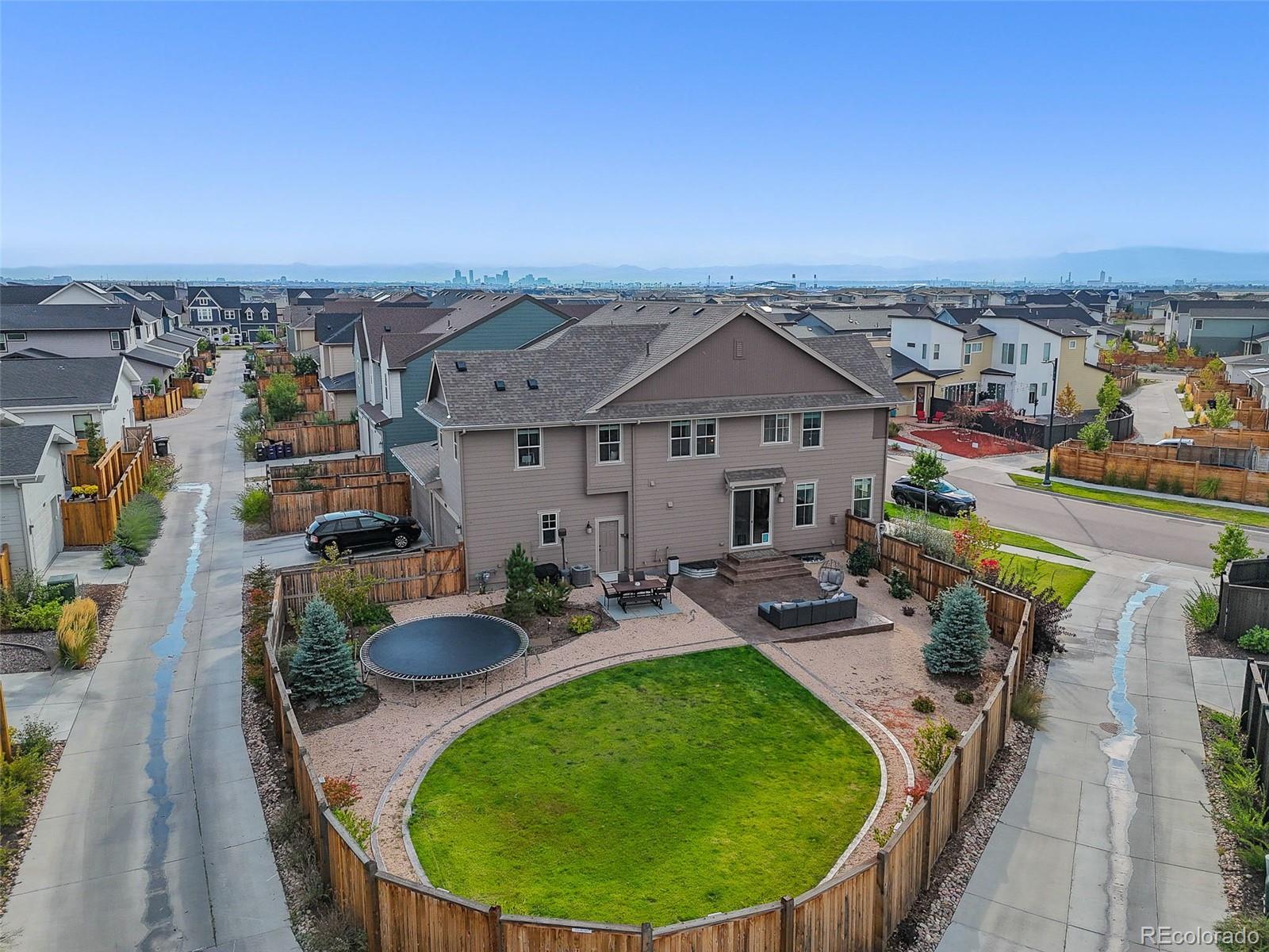 6374 North Fulton Street Denver, CO 80238 - Photo 44 of 49 an aerial view of a house with swimming pool and glass windows