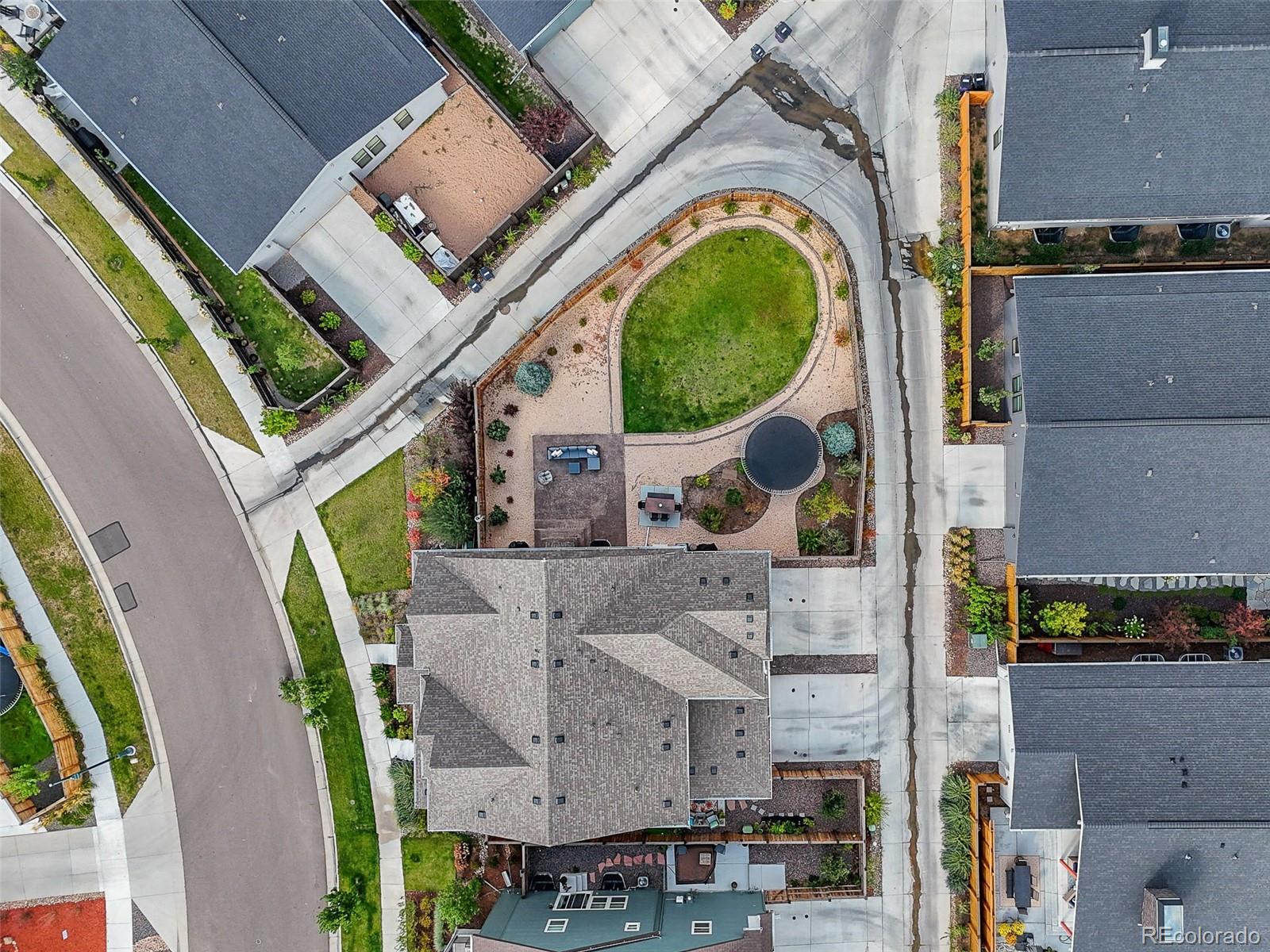 6374 North Fulton Street Denver, CO 80238 - Photo 45 of 49 an aerial view of a house with a swimming pool