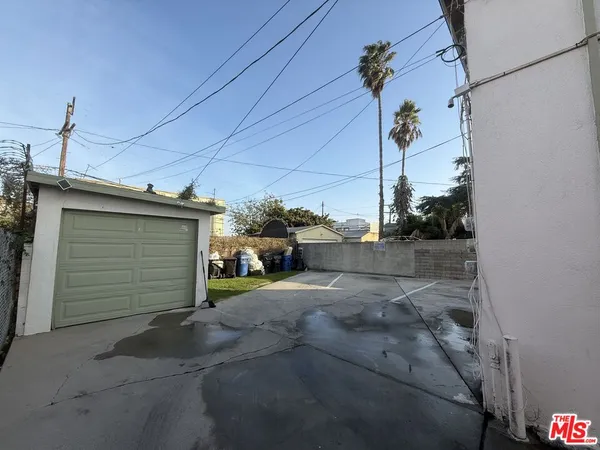 a view of a house with a street