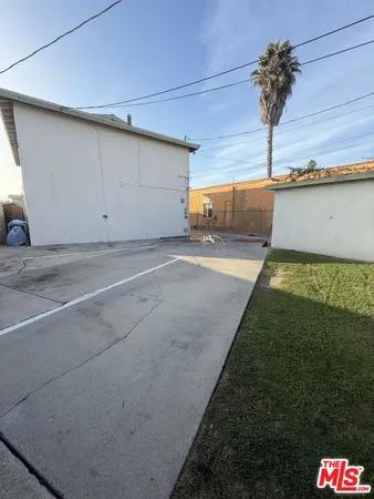 a view of a house with a street